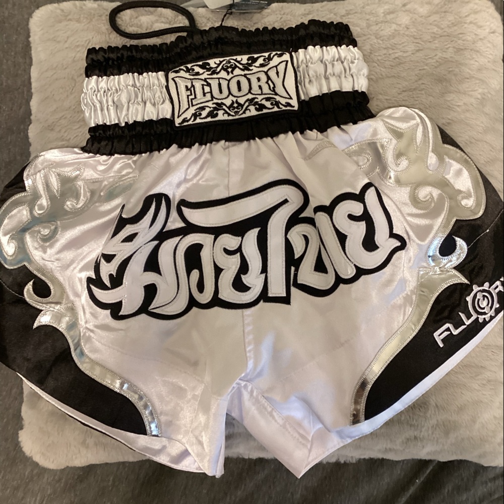 Boxing/UFC fighting shorts. Never worn. Costume or Casual.